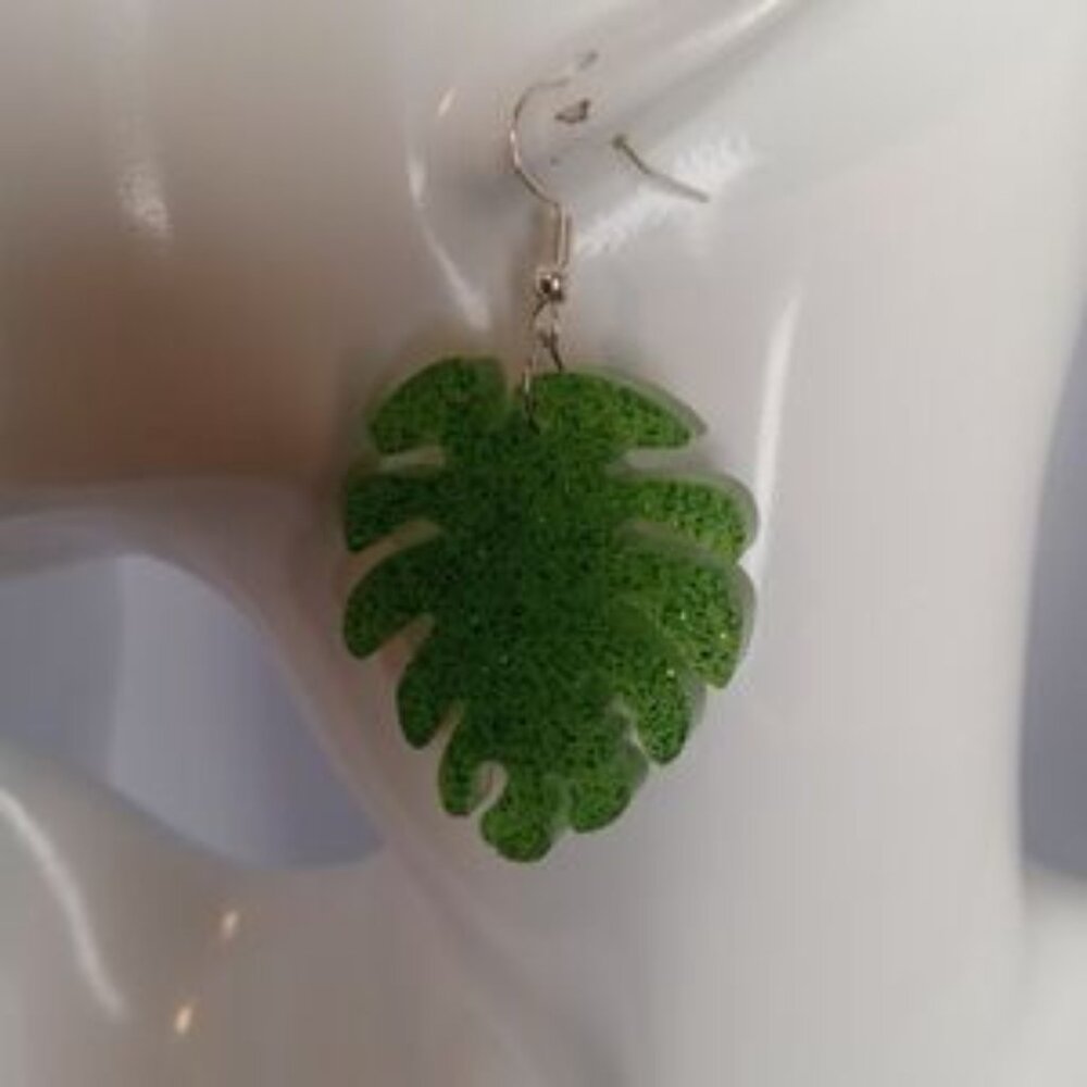 5/$50 Green resin leaf glow in the dark earrings